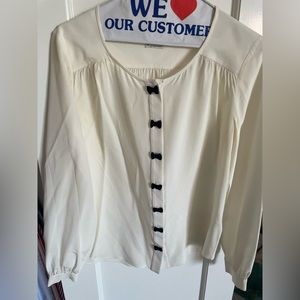 Kate Spade cream silk top with black bow ties